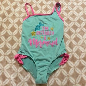Kids one piece swimsuit.